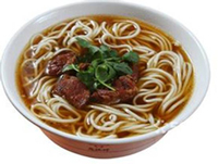 ţ